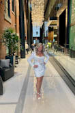 I wore this for my bachelorette night out and I just loved it. I was comfortable and the fit was perfect. I received sooo many compliments on the dress. I did use safety pins to secure the bow because the button did not work well, but overall a fabulous dress - Heather P.
