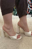 I'm having an outdoor wedding this year and have been searching everywhere for a comfortable satin chunky heel to match my dress. These are a perfect mix of comfort & elegance. They are insanely comfortable for my wide feet, perfect height, and fit like a gem. The only slight annoyance is the heel click while walking because they're a sandal with no ankle strap - definitely not a deal breaker. I plan on wearing these for my bridal shower & all day for my September wedding. - Alex M.