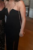 A classic black dress, with a touch of class. Very elegant and sophisticated looking. The material is stretchy so it hugs you perfectly. I ordered a plunge strapless bra to wear with it. Length was perfect with a stiletto. No need to over accessorize the dress is an eye catcher alone. - Tara P.