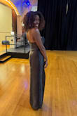 The dress was beautiful, but the corset top lacked boning, which caused it to keep slipping down. I had to wear a strapless bra and use safety pins to secure the top to it, preventing it from sliding off. Aside from that, the dress was lovely. - Crystal W.