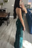 I bought this as a prom dress option. I chose another one, but I was very close to choosing this one. Everything fits perfectly and the color is gorgeous. - Shantel R.