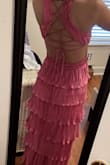 This dress fits perfectly! The top has lots of support and makes you feel secure. Dress is pretty long, which for me is a good length, when I put heels on. Overall, great fit and beautiful dress! - Athens B.