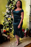 Wore this for my holiday work party and Christmas Eve. It fits so beautifully. I would say it runs true to size. Has some stretch which is great. Such a beautiful fit and color. - Eleana E.