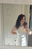 It's an adorable dress, however, the halter straps are oddly long and will need to be altered for proper fit. Otherwise the length is great. It's not see-through at all. - Cassaundra D.