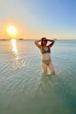 Fits great after sizing up, which I typically do in swimsuits. I'm 5'4, 133 lbs, 28 in waist, and the large is perfect. - Angela L.
