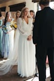 Originally bought this for the rehearsal but once I tried it on, it fit so well that I made it a surprise second dress for my ceremony! It's gorgeous. So classic and modest and fits amazingly! - Rachael B.