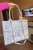 Gorgeous bag, the colors are slightly more purple in person, but it's still beautiful! - Julia L.