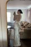 I ordered a size small and it fit perfectly, the only downside is there's a little extra fabric around the bust, but I also have 0 bust. Great quality, I ordered it for my wedding reception. Lots a freedom for activities! - Hannah M.