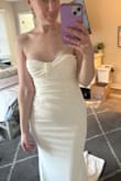 Dress was a great value and fit well for what I paid for it. I ultimately decided to go with another dress because the fabric was a little heavier than I imagined. Did love it on though. - Megan H.