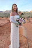 I was so comfortable. So gorgeous. It was lined lace and off the shoulders with thick white lace detailing around the neckline. Just the right length of train for the outdoor wedding we had. - Andrea M.