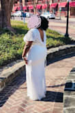 Amazing dress. Given the sale price I ended up buying two so I could do some few alterations namely raise the neckline & cover the back a bit more. Ended up giving me an equally beautiful dress which was a little more modest. Got lots of compliments and I'm glad I got it. Have to say though that things get caught very easily in the lace, but for the price, no complaints because you get what you pay for! - Angelique G.