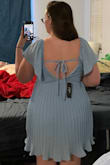 Absolutely loved this color and dress. I wore it for my friend's bridal shower and received a bunch of compliments. I would say one thing, it was a lot shorter than I expected and probably should have worn shorts underneath. I was between sizes when ordering and got the XL instead of the XXL, having a bigger butt/bust I probably would have been more comfortable in a size up as it would have been less form fitting. However, I do plan on rewearing it to take engagement photos (with shorts underneath). Hope this honest review helps! - Caroline R.