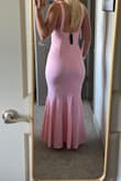 This dress is so pretty and simple with a unique little flair at the bottom! - Madeline P.