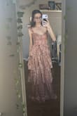 The color of this dress is actually more stunning in real life than on the photos. I love the shimmery fabric! The only thing is I wish there was more support in the cups. Other than that, LOVE! - Laura D.