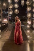 I loved this dress and received so many compliments. I loved that it was long and kept me warm when needed. It is so flattering.  I of course needed the bottom hemmed and did have some extra organza removed around the hips for a slimmer look. Overall, I am so happy I bought this dress. - Robin C.