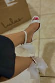 I love high heels; this beautiful heel measures 4.05 inches high. I love them. - Ana A.