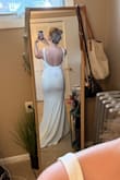 Purchased this as a back up for my elopement ceremony. The back of this dress is my favorite part! Material is nice and also stretchy. - Abby W.