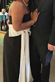 The fit was perfect. I did have the bow taken up because I'm short - Tiffany H.