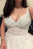 Truly a stunning dress!! I feel like a princess :) I usually wear a large with lulus dresses, but this one has a lot of give and runs a bit big. If there were medium sized dresses available, I'd probably trade it in for a medium. The only thing I don't like about it is that the boning isn't that supportive in the chest area (maybe also because it's a bit large on me) and so it gives me a bit of a strange underboob shadow, especially when sitting down. When I'm wearing a wired bra (as with the second photo) it's much better, and I'll probably try getting a nude strapless. It's also very long, will definitely need tailoring. So SO beautiful! - Angelina L.