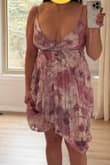 This is a very pretty dress and offered decent support for my 36Ds. I'm not wearing a bra in the pics. I pulled it up in the second pic to see what it would look like if I got it shortened because I don't love the high/low look. - Monica F.