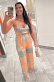 Thin and breathable, super soft and silky material. Adjustable for length and cleavage cover - Devan W.