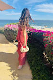 I got so many compliments on this dress!!! It was so comfortable and perfect for a wedding in Cabo. I did wear a strapless bra to help hold it up. I got a M and it was great. The length with heels was perfect. Definitely recommend! - Julia C.