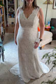 I'm 53 years old and wanted a fairly casual and inexpensive dress for my second wedding that still looked like a bridal dress. This dress fit me beautifully; had I kept it, I might have taken it in a little in the shoulders so that the waist hit me more like an empire waist, which I feel would have been more flattering. That also would have raised the hem a couple of inches, so it would not need to be hemmed. In the end, I decided to buy a long sleeved dress I found at a consignment shop and return this one, but I would have been happy with this if I hadn't found the other dress. You will not regret ordering this dress! I wear a size 12 in most clothes if that's helpful. (Ordered the XL) - Amy R.
