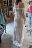 I'm 53 years old and looking for a fairly casual and inexpensive dress for my second wedding that still looks bridal. I loved the neckline and the details on this dress, but it didn't lay smooth in the torso, it buckled and therefore was not flattering. (Even with a strapless bra) I'm not sure if a smaller size would have fixed it, or if I could have had it altered to fit better. It seems like it needs more structure in the torso. Possibly if you had a bustier and attached the dress to it somehow, that might work. I'd encourage you to order it and try it on if you like it. I just think it didn't work for my body shape. - Amy R.