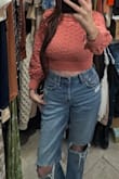 I love this. I ordered medium and I'm glad I did. After the wash, it definitely fit snug and hugs the body. If you're larger chested, size up. I'd love to have all colors. This one is like a coral pink, super cute. It's see through but I don't think it's very noticeable and the back is super cute too. I might even size up to a large. - Amie M.