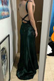 I really love this dress! looks just like the picture! amazing material and so comfortable! runs a tad big but easy to fix at the tailor :) definitely recommend! - Mai G.