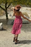 Super cute dress. The color is divine. The tiered layers are so flattering and corset style bra cups are totally sexy. Ordered a size small. Slightly tight in ribs but boobs are perfect. - Cassidy B.