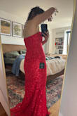 I really loved the color of this, and with the way the embroidery had a shine, it really made it pop against the fabric. Ordered up a size from what I normally wear based on other reviews and it mostly fit, just a little bunching in the back as you can see in the second photo. - Madalyn C.