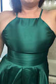 I don't think this is for large chested girls. I am a 38DD, and I was falling out of the sides quite literally. - Rachel K.