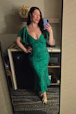 This dress was AMAZING.. for me anyway. Size down if you're very slender. I'm short and very curvy so I have a hard time with more form fitting dresses but after reading reviews I went for my normal size large and this dress was perfection on me. It was cut lower than I anticipated so had to tape a couple places and I couldn't wear a bra because then it pulled weird but an XL def would've been too big. Unless you have a super long torso or zero butt the zipper comes down onto your butt and looked a little lumpy but not terrible. Otherwise the material was gorgeous and I got soooo many compliments. It was almost ankle length on me not midi bc of my height but I actually loved the length. I would buy this in every color. - Valerie