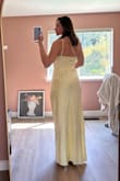 I was very worried about having to find a yellow satin dress for a wedding, but this one is beautiful and very comfortable. I can wear a strapless bra with it and it drapes in a flattering way across my stomach. Highly recommended it. It does seem to run a bit large, I tried a M and an L and the large was waaayy too big and the medium fits well but is still slightly loose. - Sophia C.