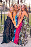 Wore this to an adult prom fundraiser. Fit perfectly, except a little loose in the chest. Loved the appliqué and high low design. The zipper was a little hard to get up. A classic black dress! - Bethany R.
