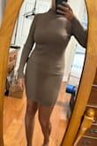 This dress has the perfect amount of stretch to hug curves but not too much to show any lines from underwear or any rolls. It really flatters the positive and hides the negative. I got compliments on it. I found it to be comfortable and just the right weight of material to wear on a cool spring day. Love it! So glad I have it in my closet. - Melissa L.
