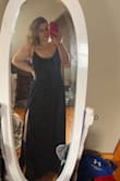 I sized up and it worked perfect because of the tie in the back! Wearing this to my senior prom! Shipped very fast too!! - Ila B.