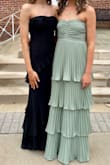 Bought for my daughter for Prom. It is a stunning and classy dress! She got many compliments! The best part is she'll be able to wear this perfect black dress again in the future. The fit was great around the bust, but did gape a tiny bit on her lower back. She is a size 00/0 with a 33" inseam. The length hit perfectly with no alterations. - Rachel P.