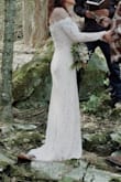 I'm obsessed with this dress! The fit was perfect, and the material is not heavy. I received many compliments and felt beautiful on my big day. - Trinity S.
