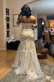 I bought this dress for my wedding in June, so I still have to get it altered, but I'm so glad that it fits as well as it does! I'm between a size 6 and 8, but I bought a size 6 and it fits kind of tight, but I feel like an 8 may have needed more alterations. Either way, too cute!! - Erin P.