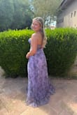 Went back and forth on the dress I wanted to order, I am so happy I chose this one. The dress itself is absolutely stunning for the quality. I am shocked it is only this price! If you are just thinking about it, do it!! I wore this as a bridesmaid for a floral/pastel theme, and it couldn't have been any more perfect. I am 5'2 and it was a little long, see photo (I am wearing 2 inch heels), but it was the perfect length for the wedding! - Snezhana L.