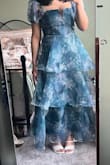 First of all, if you are not familiar with Organza, you will most likely be disappointed. This dress does not have any stretch whatsoever! I am a size small and I ordered a size small, it fits perfectly just that I fear to take deep breaths without feeling like the zipper will pop open (based on previous reviews) but I tested it and took a bunch and hunched over and the zipper stayed intact.. the dress itself is beautiful! It was very wrinkly and static-ee when out of the package, but I ironed on low and it looked amazing. It is longer on me because I am 4'11 but not too long when I have to worry about stepping on the fabric (with heels). The only downside in MY opinion is the seaming on the inside is itchy! Especially around the waist and armpit area, the waist area could be easily fixed by wearing high waisted briefs. Not too sure about the arm area tho.. a bra helped a bit might have to look for one with similar color to the dress - Stacie H.