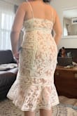 Loooooove the way this dress is flattering on me. I just had to adjust the straps to almost the max I may actually get the chest area adjusted even further. I am petite, so it's a little long for a midi, but I don't care, I love the way I feel in it! Got it for my engagement party coming up - Carmen A.