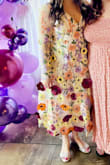 I wore this for my Bridal shower, its theme was love is in bloom and it was absolutely perfect. The pops of color in the flowers really added to the beauty of this dress. - Kayla W.