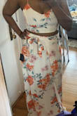 The print on this outfit is beautiful! BUT, with 34D breasts, I needed a larger size. My breasts were quite snug and looked a little flat. Also, I normally wear a 29" in bottoms, and this was tighter on the waist. I would recommend sizing up if you have hips and larger breasts. This is a very long skirt also, so I will have to wear heels with it. Sadly, I could not return it because I was outside of the return window - busy medical student just trying to make it through school and have a little fun every now and then. :/ - Jessica S.