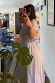 I loved the material, it's super cute, but I gained some weight. I'm 3 months postpartum, and my shape is different from what I'm used to. This dress hides the hips and belly well, but it's tight on my shoulders. I exchanged for a large one and had the same problem. I feel like if I hug someone, the back of the dress by the shoulders would rip. I guess this is my big back era. - Steph W.