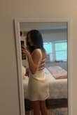 This dress fits me perfectly, and the open back adds a nice detail. I ordered a small, and am on the taller side, and it still was a good length for an event like graduation. Definitely recommend! - Emily B.