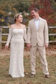 My wedding dress was so beautiful. It fit really well along my waist and arms. I am short though so I did have to get it hemmed. I would highly recommend it. - Katelyn O.