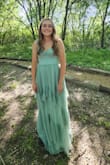 My daughter wore this to prom, and it fit her style and personality perfectly. The built in bra was comfortable and supportive, and it was very well made and not itchy. Overall, she was very happy with it, and the length was great to cover her walking boot (from an ankle injury). - Erin W.
